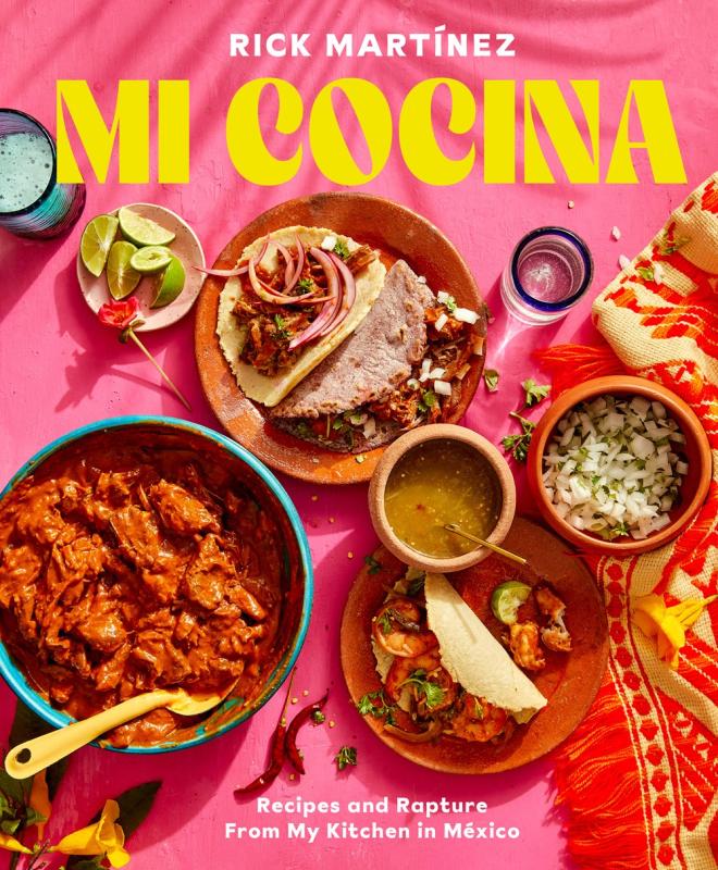 mexican foods on a brightly colored tablecloth