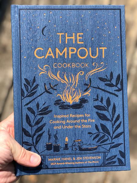 blue cover with illustration of campfire
