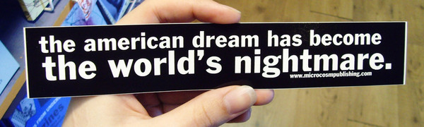 a black sticker with white letters reading the american dream has become the world's nightmare