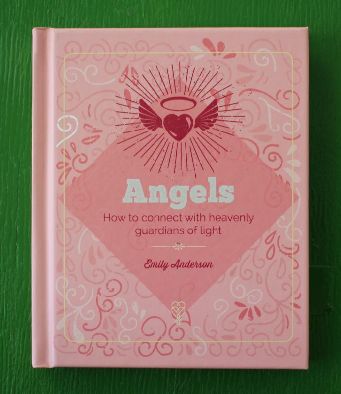 Pink cover with a design motif of angel wings