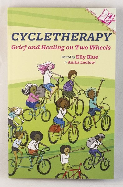 A green book cover with an illustration of several different women bicycling over a grassy hill