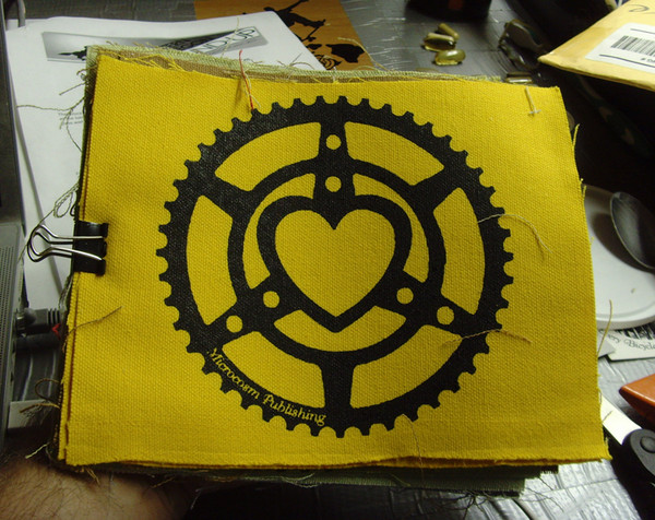 microcosm logo of chainring heart on patch