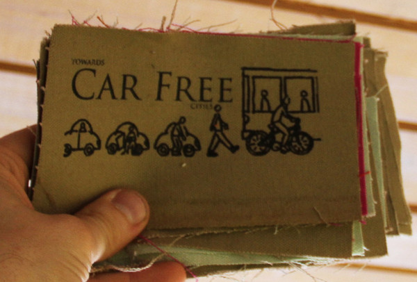 patch with image of cars and bicycles and text: "toward car free cities"