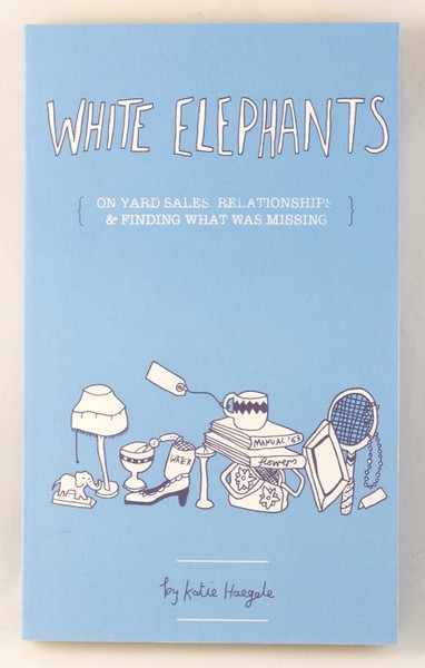 A light blue book cover with illustrations of a small, white elephant, a lamp, a tennis racket, some books, a shoe, and a mug