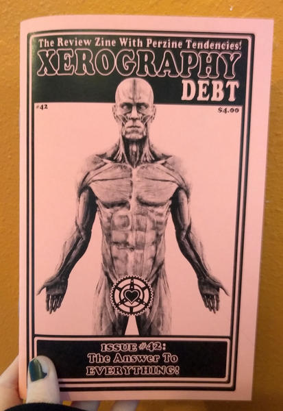 Cover of Zerography Debt #42 which features a man with no skin