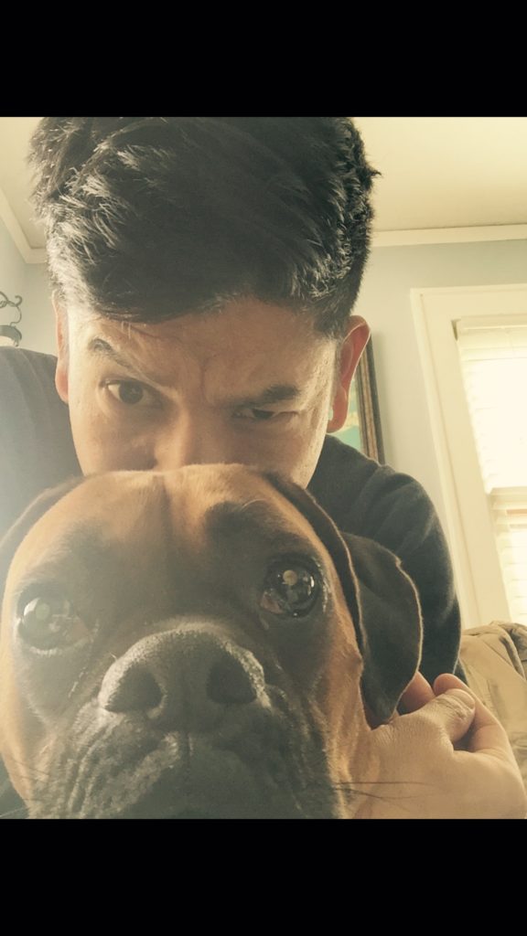 tomy huynh and canine friend