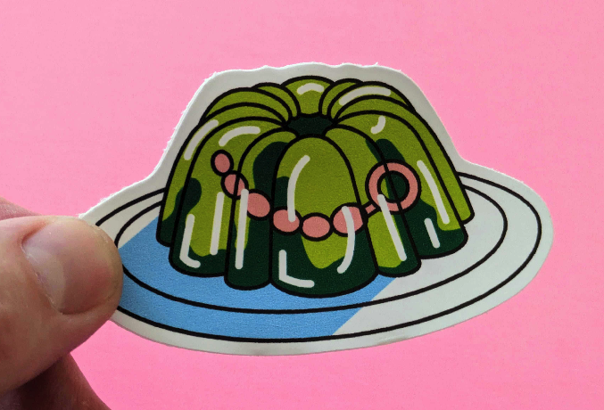 a neon green gelatin salad with a pink sex toy inside