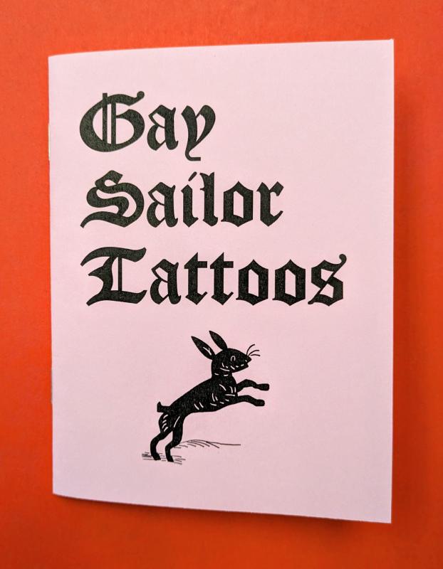 Light pink book cover featuring title in bold, black, Old English-style type, with a bunny rabbit from traditional sailor tattoo imagery beneath it. 
