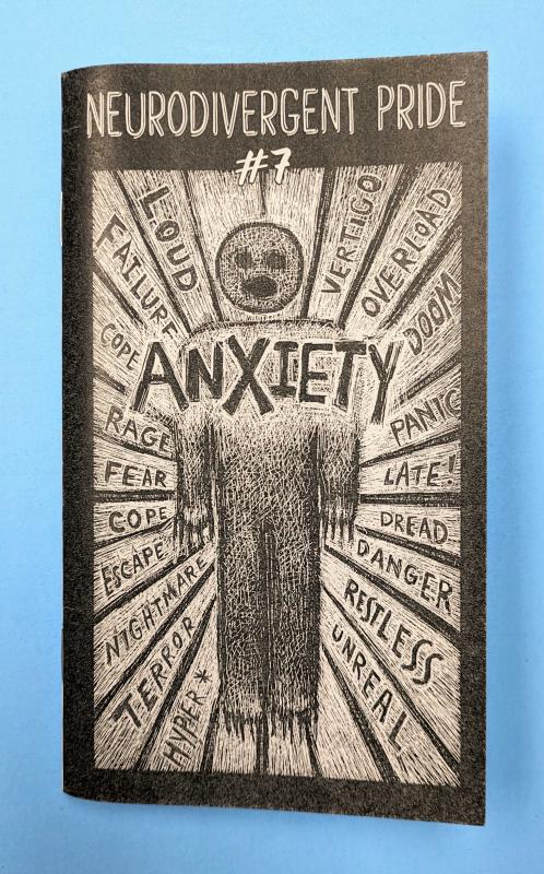 Black and white zine cover with illustrated figure in the center with rays of negative words radiating from them. 