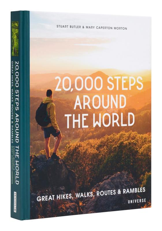 sample book over white with the cover featuring a hiker over a luminous landscape