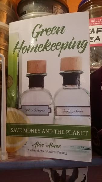 Green Homekeeping: Save Money and the Planet by Alice Alvrez [Close-up on bottles of condiments and of course half a lemon for color]