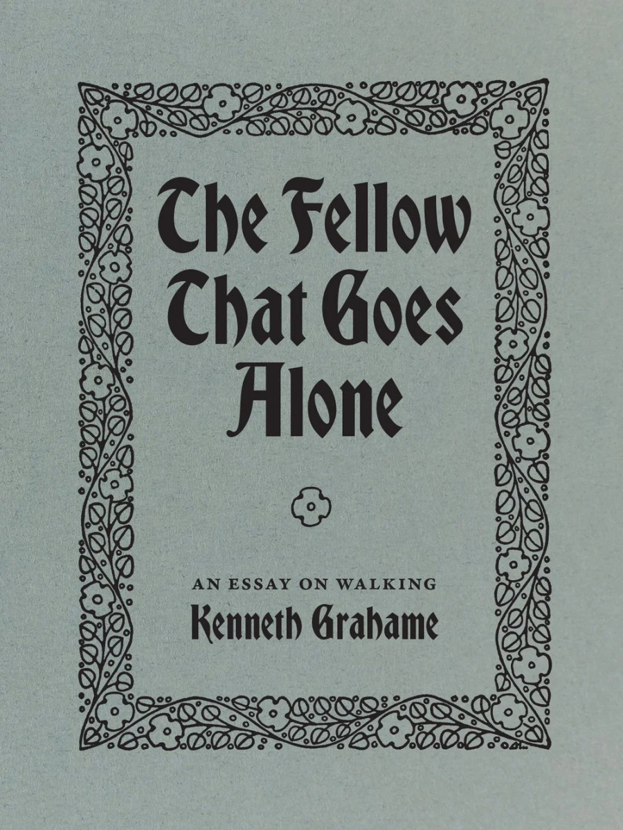 ornate arabesque border with a small flower in the center, black over grey