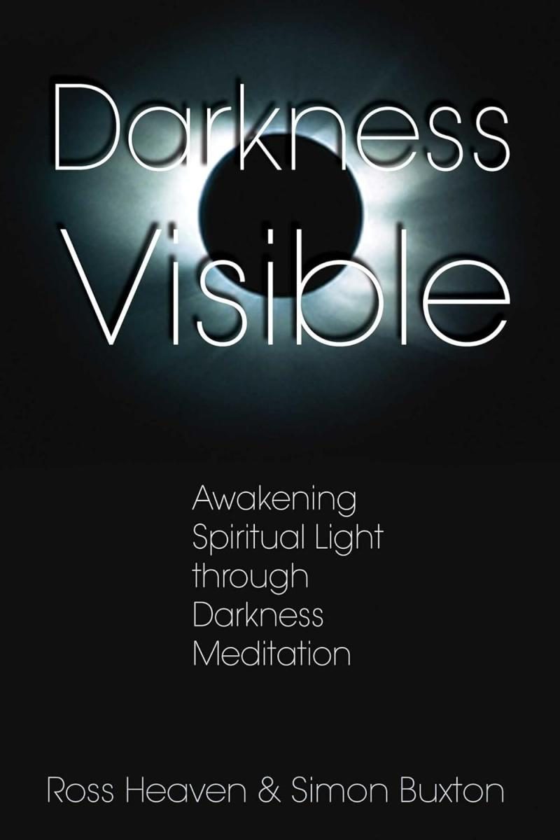 black cover with white text and solar eclipse 