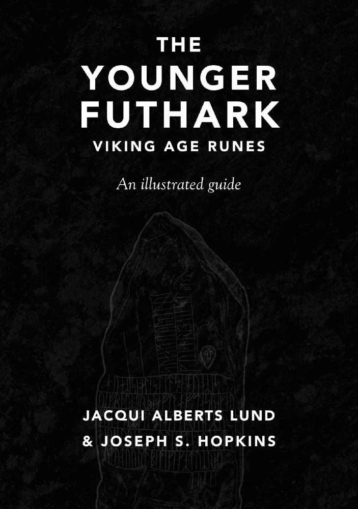 a black background with a faint rune stone in the center in grey outline