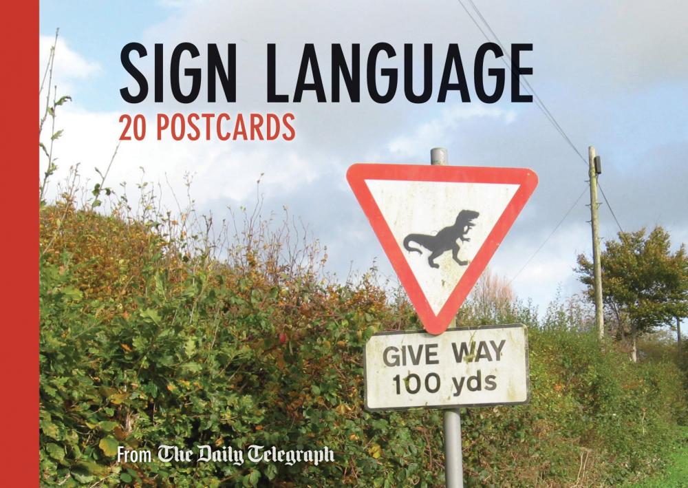 Cover with photograph of amusing road sign.