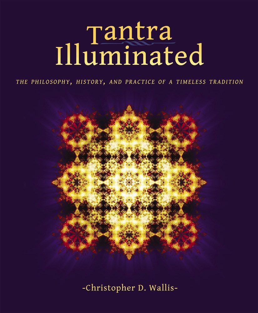 Glowing intricate patterning like flowers in yellow over a black background