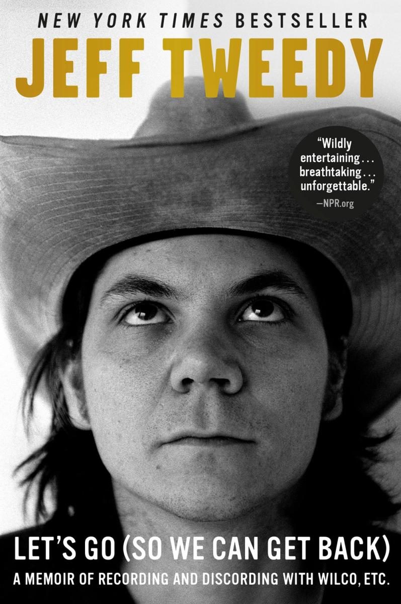 Headshot of Jeff Tweedy in black and white facing up