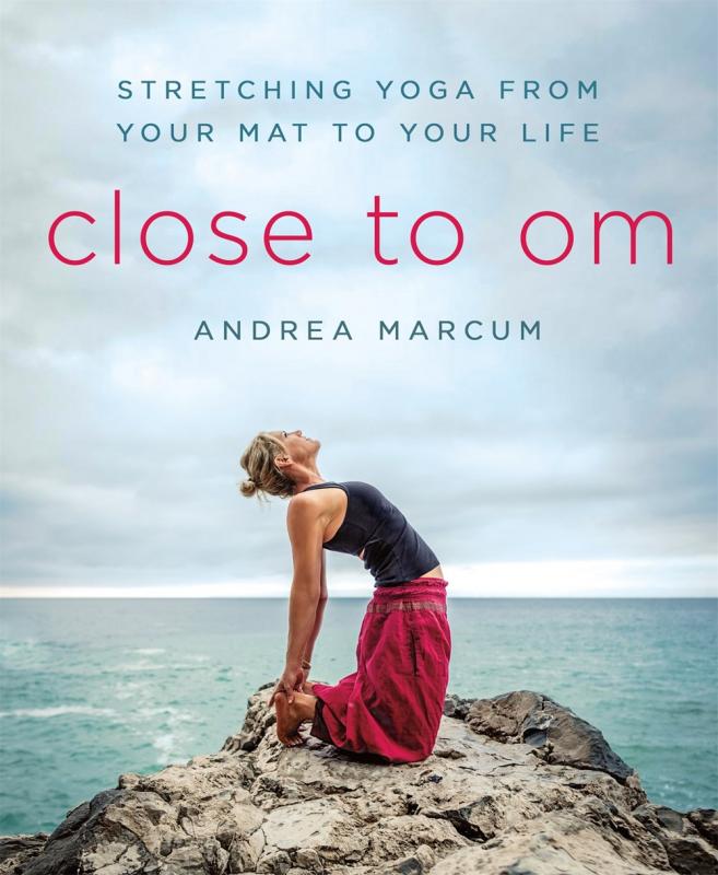 Cover with photo of woman practicing yoga in front of an ocean