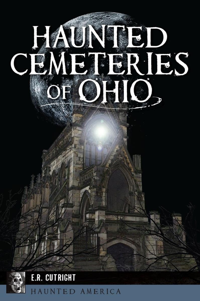 Church with a glowing steeple with a blown up moon over a dark background