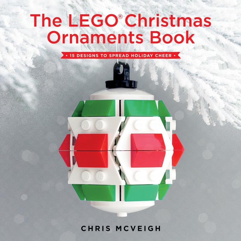 Book cover featuring a green, white, and red ornament made of Legos hanging from a white Christmas tree.