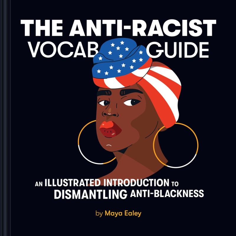 A black woman wearing large hoop earrings and an american flag head wrap 