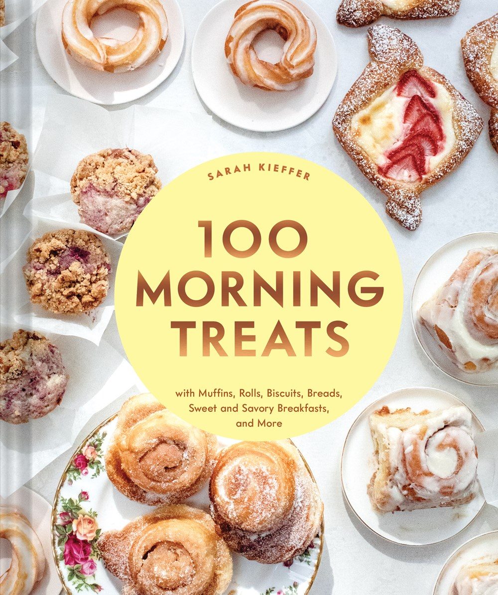 A table set with an assortment of breakfast pastries 