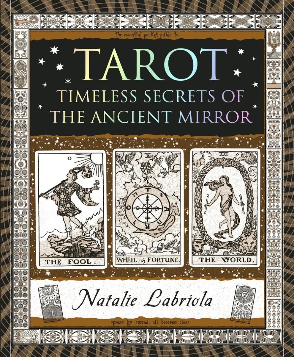 black and brown cover with illustration of cards with white text