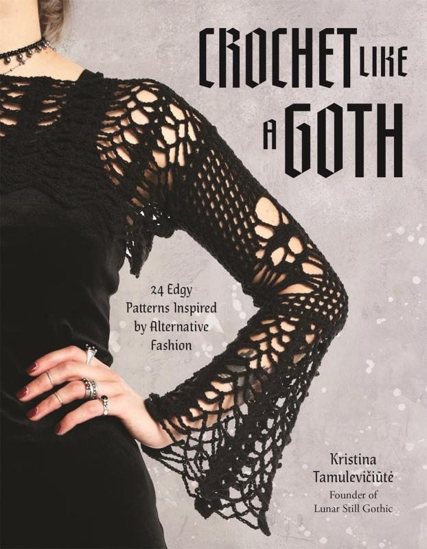 Intricate work on the sleeve of a black dress