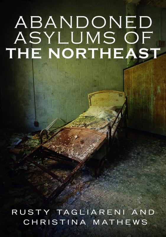 Broken and derelict asylum bed in a yellowish light