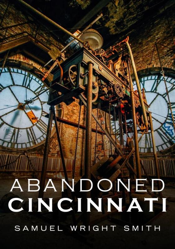 inside an abandoned clock tower, with the clock face inside connected to gears and machinery