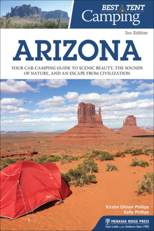 tent pitched beneath a hoodoo in the southwest