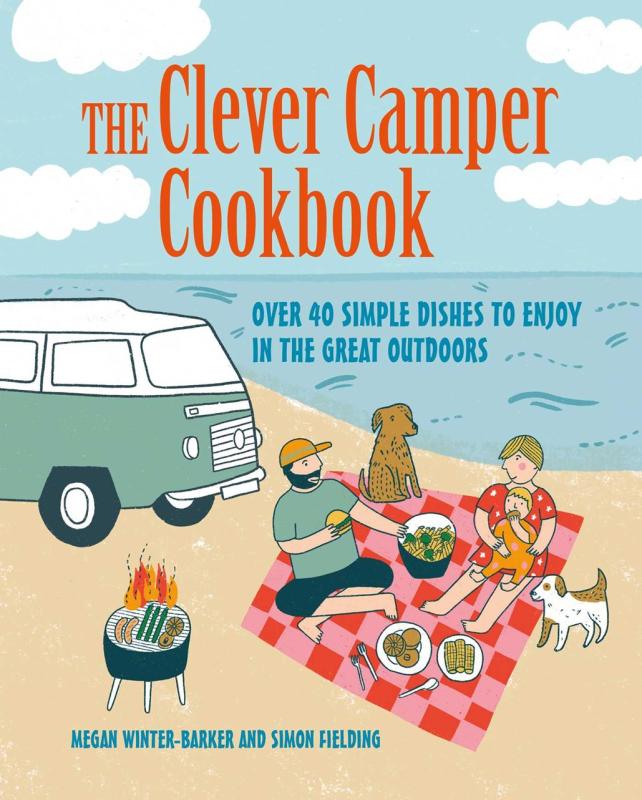 Cartoon family sitting on a picnic blanket with two doggos next to a green VW van next to the ocean