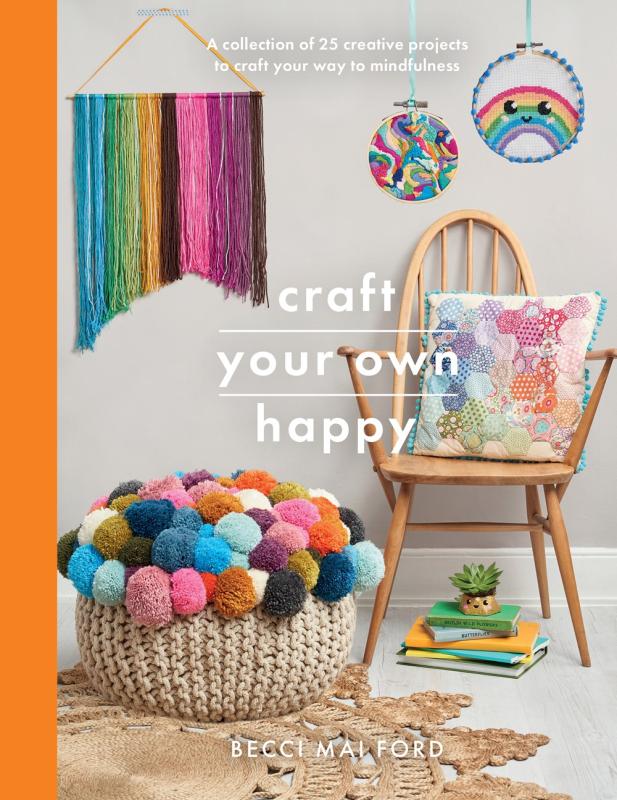 yarn all around a living room with a chair, a puffy puff, yarn banner on the wall, and a rug