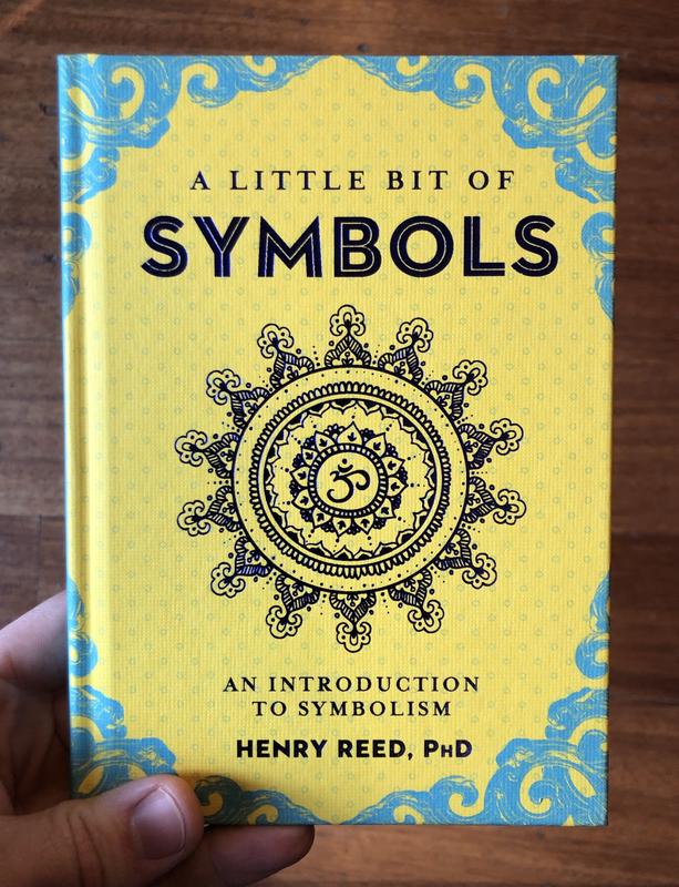Cover of A Little Bit of Symbols, which features a mandala with an om symbol in the center