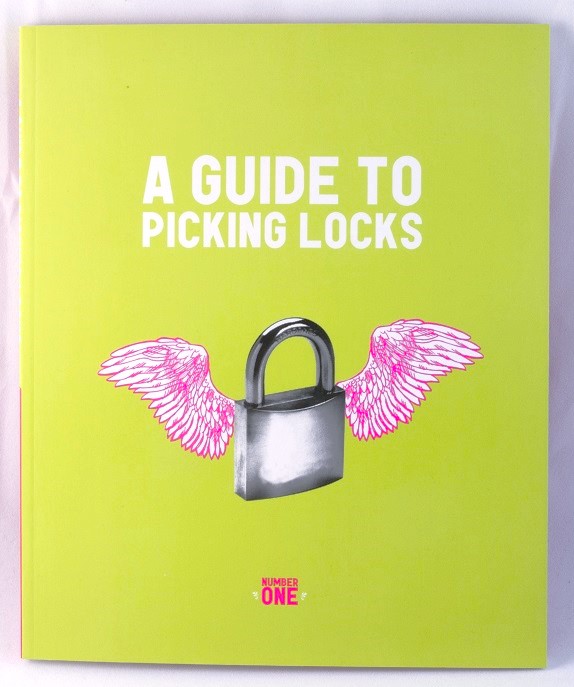 a yellow-green book cover with a winged lock