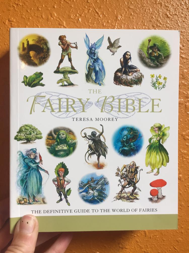 White cover with various images of fairies