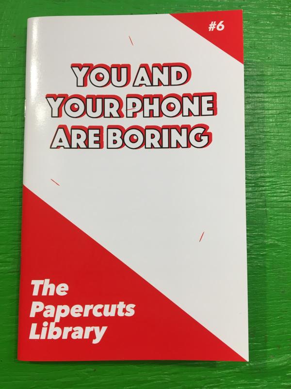 a red and white cover, with the title in bold lettering