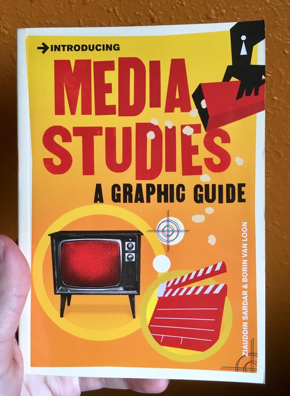 Book cover titled Introducing Media Studies. The cover is orange with a red popcorn bucket, TV, and clapperboard.