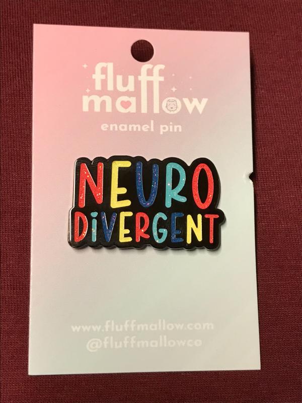 the word 'neurodivergent' with each letter a different color