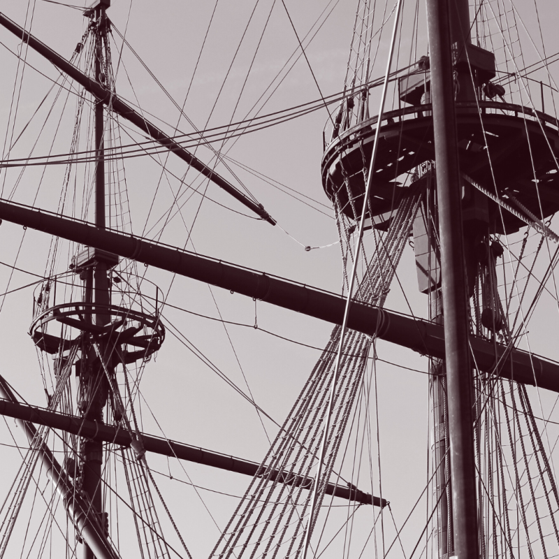 ship masts and rigging with crow's nests