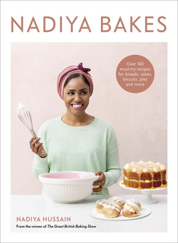 person with a whisk with a bowl, and a cake and pastries