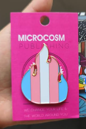 trans pride flag colors in the shape of a flame