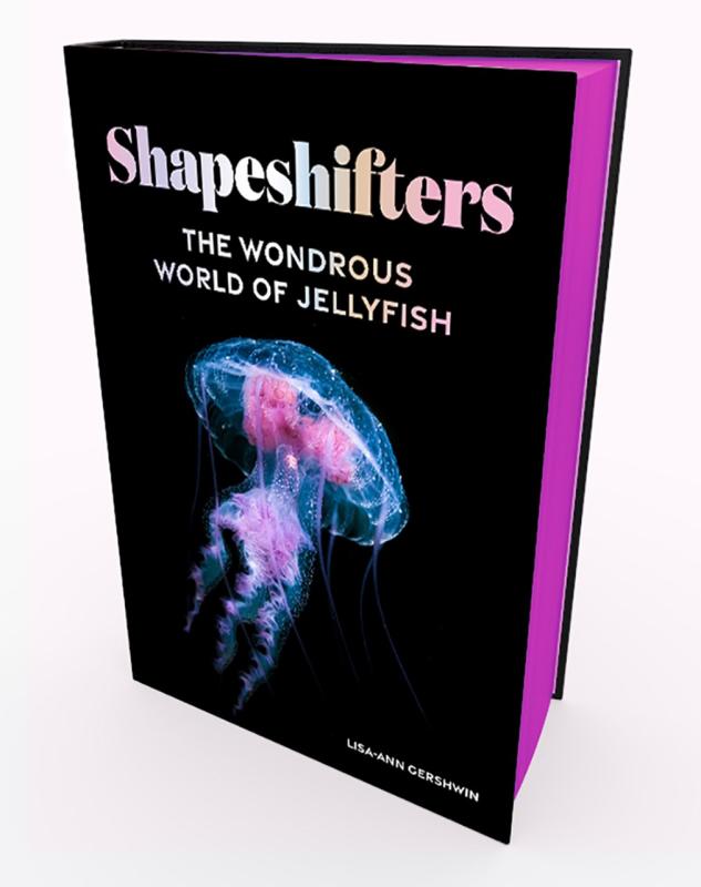 Black book with a blue jellyfish and white text with purple edge paper