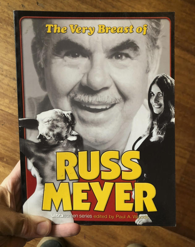 A black and white image of Russ Meyer, juxtaposed against images of scantily clad women.