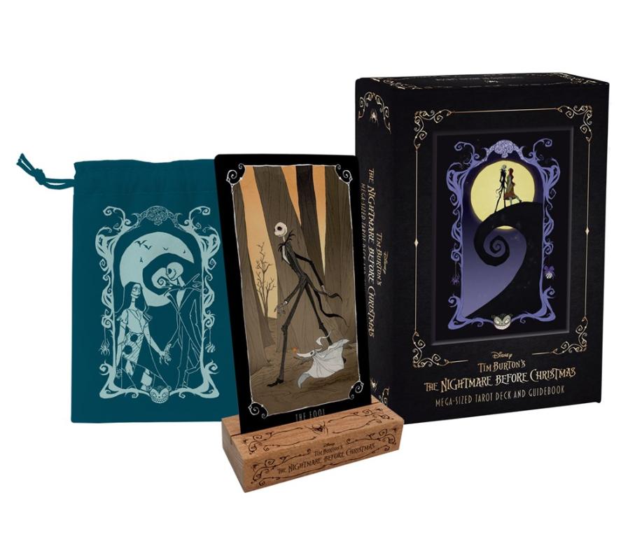 a deck box with an image of two figures from The NIghtmare Before christmas on a hill, next two a tarot card and bag