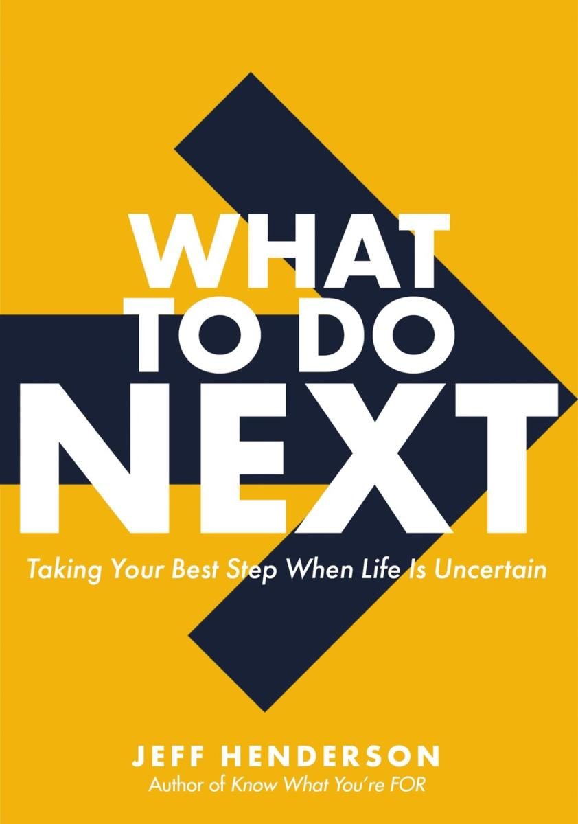 arrow pointing left with white text over orange