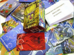 Deck of cards showing different colorful elemental goddesses and mystic beings