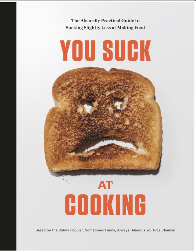 a burnt piece of toast with a frown face cut into it, on a white background