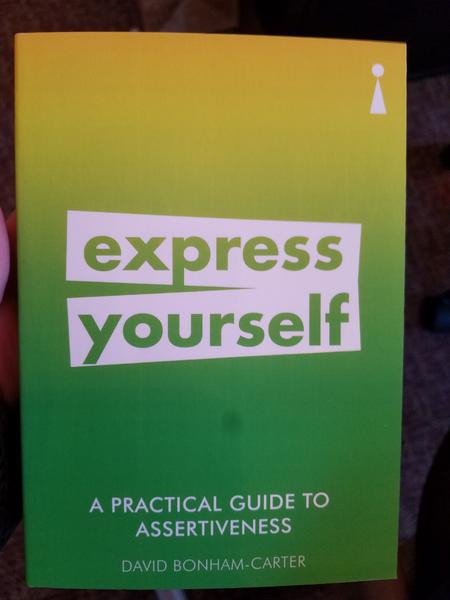 Cover for A Practical Guide to Assertiveness: Express Yourself which features the title in white text on a yellow to green gradient background