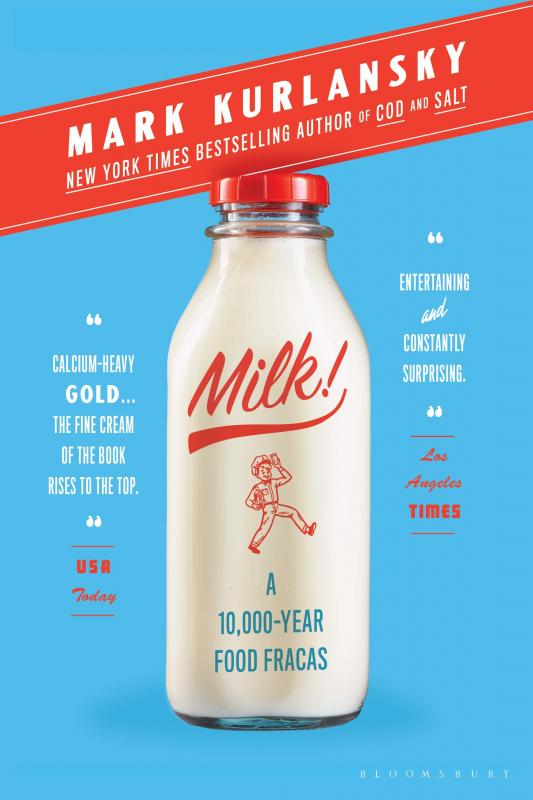a glass bottle filled with milk.